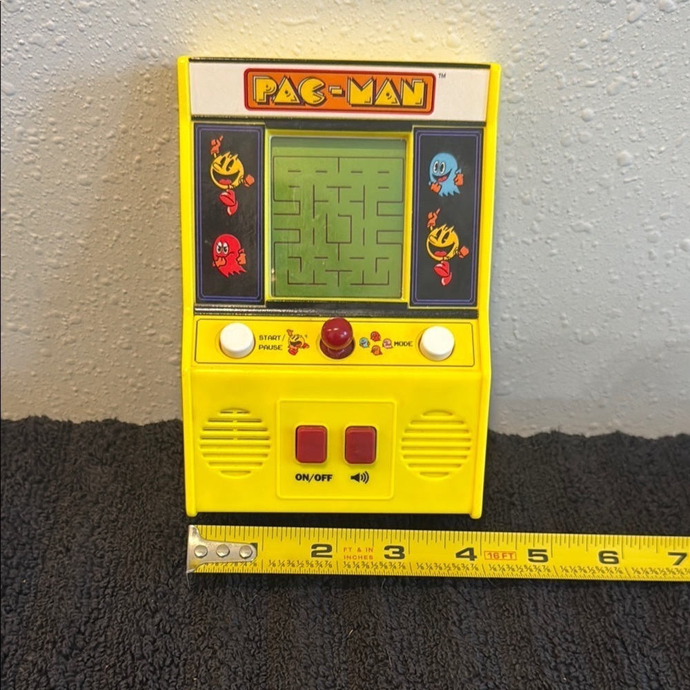 PAC-MAN & BANDAI NAMCO Yellow Handheld Console with Classic Game Design